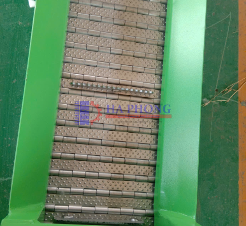 Băng tải xích tấm bản lề